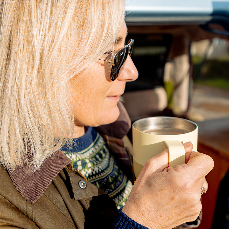 12oz-rise-mug-k9 12oz_rise_coffee_mug_wax_yellow_woman_drink_closeup_square.jpg
