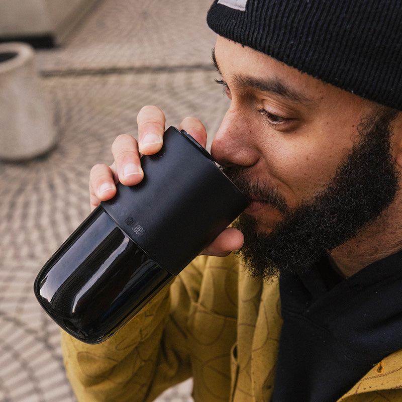 16oz-rise-tumbler-j8 16oz_rise_tumbler_black_man_drink_square.jpg