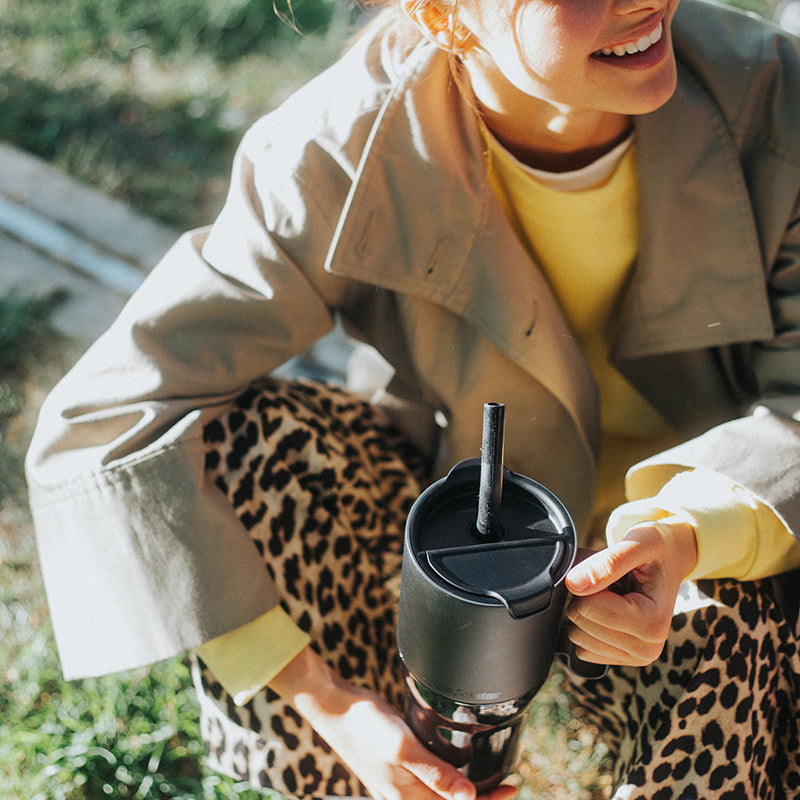 26oz-rise-tumbler-with-straw-lid-i2 26oz_rise_tumbler_black_woman_topview_square.jpg