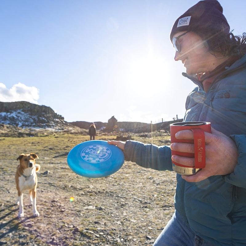 12oz-camp-mug-u8 insulated_camp_mug_12oz_woman_dog_frisbee_square.jpg