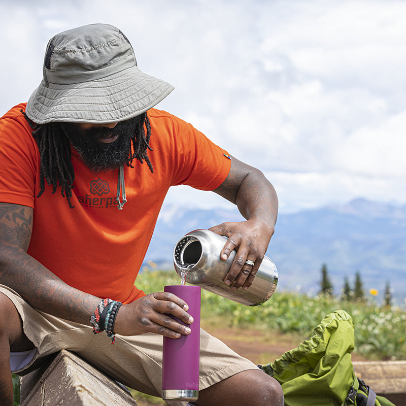 64oz-tkwide-with-loop-cap-n7 tkwide_64oz_bottle_backpacker_mountains_filling_square.jpg