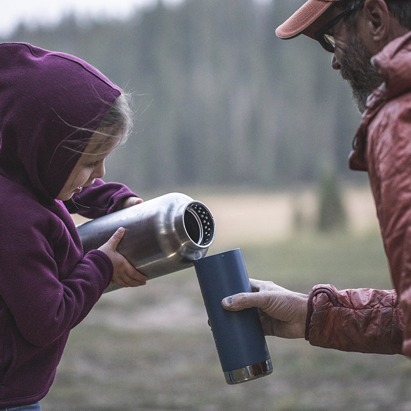 64oz-tkwide-with-loop-cap-n7 tkwide_64oz_bottle_girl_dad_filling_square.jpg
